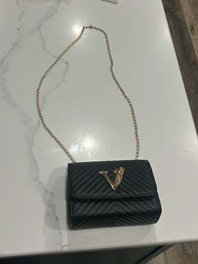V-Logo Quilted Black Crossbody Bag with Gold Chain and Tassel